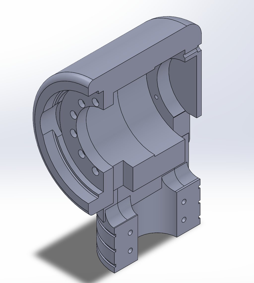 Section view of the joint 3 housing, showing the bore for the actuator and the clamp that grips the tube below.